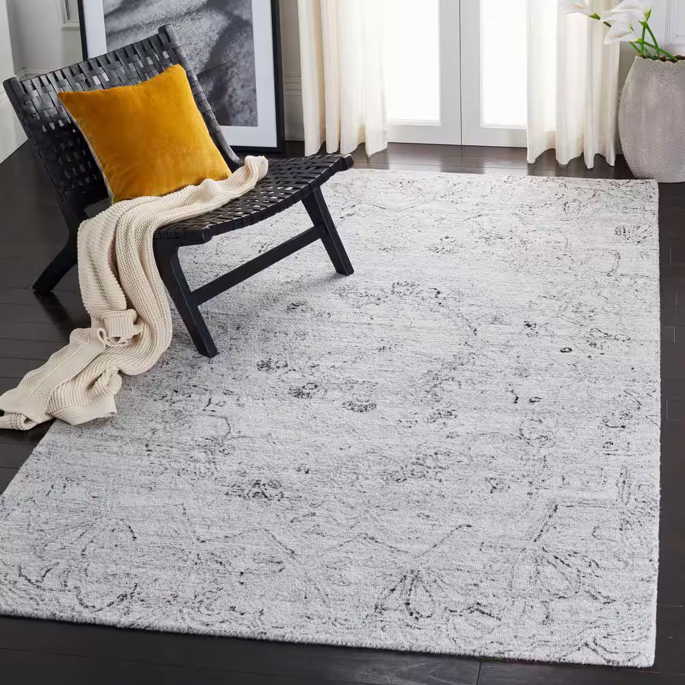 Abstract Ivory/Black Doormat 2 Ft. X 3 Ft. Distressed Medallion Area Rug