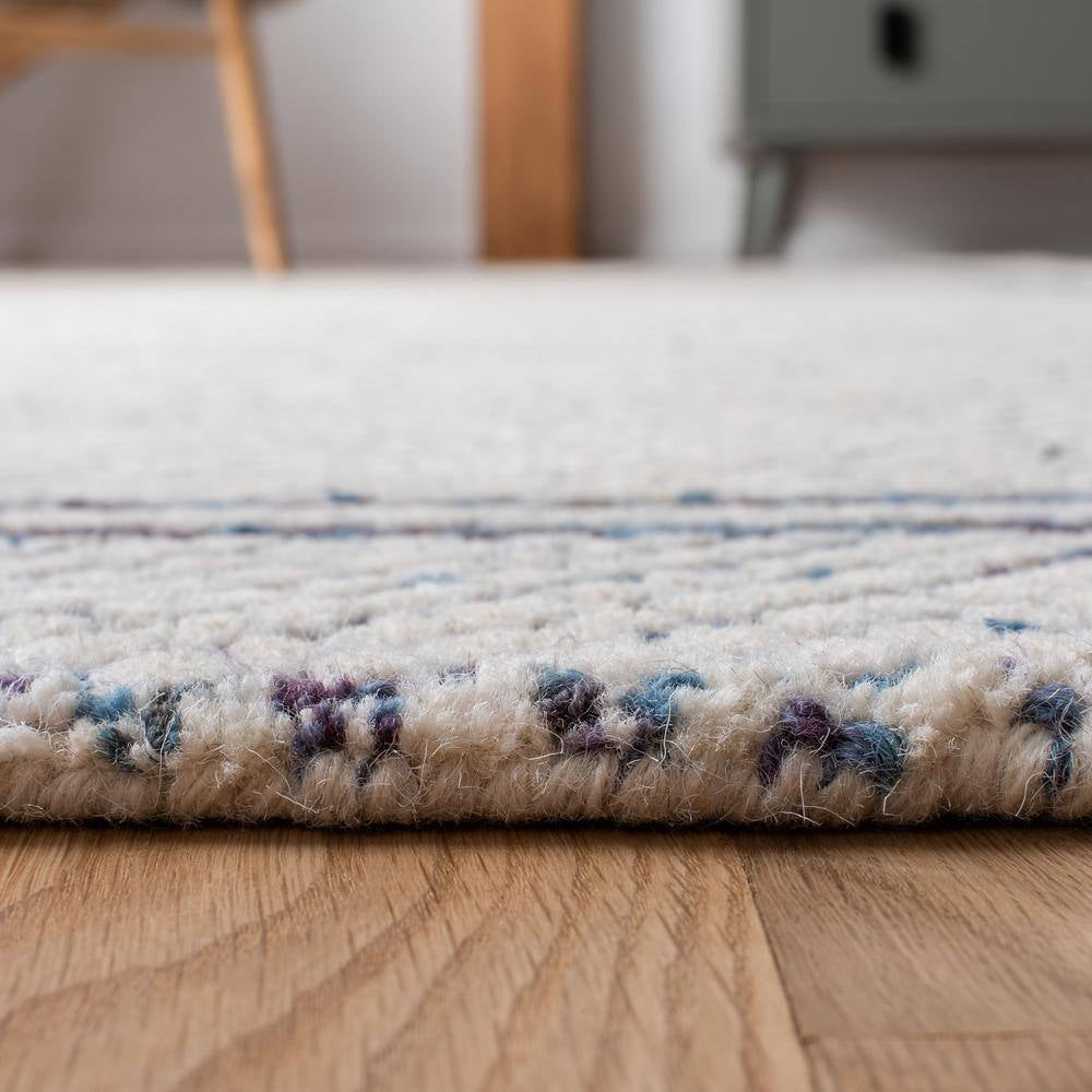Abstract Ivory/Navy Doormat 2 Ft. X 3 Ft. Border Geometric Area Rug